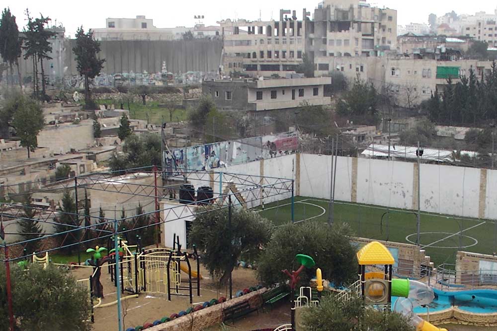 Playground built by Aida refugees to offer children escape from an overcrowded camp. Credit: The Oakland Institute